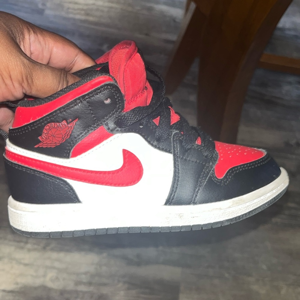 Red black and white Jordan 1s